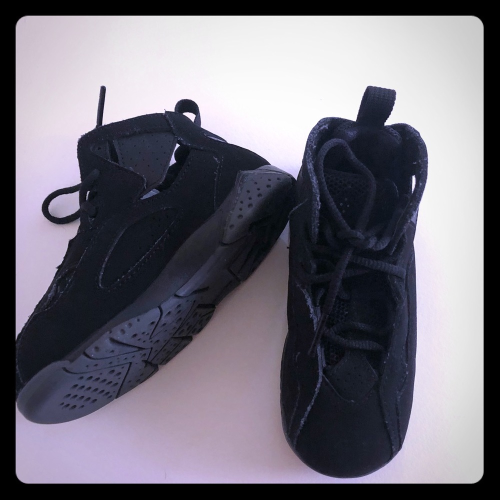 All black barely worn kid shoe.